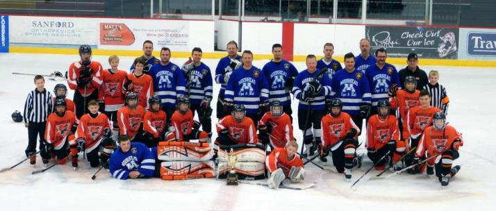 website cops vs kids hockey game